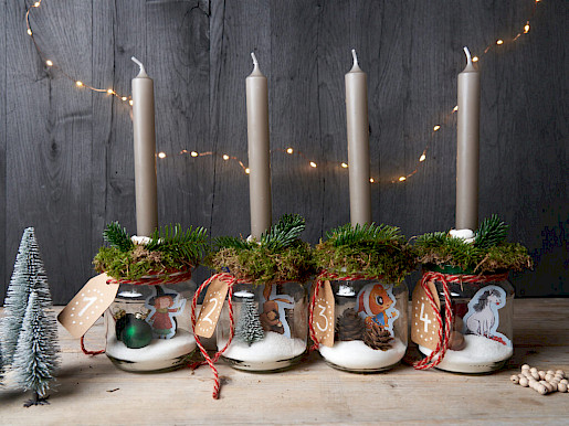 Schritt 9: Röllchen befüllen und Adventskalender aufhängen