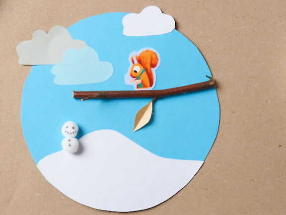 Schritt 14: Wolken und Schneemann aufkleben